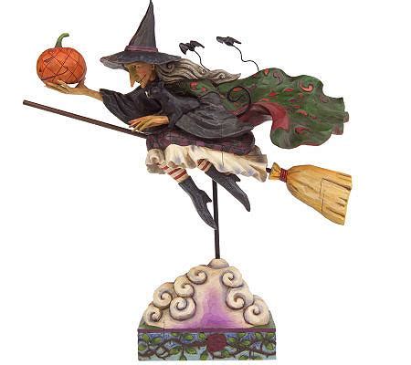 Flying witch on a broomstick figurine